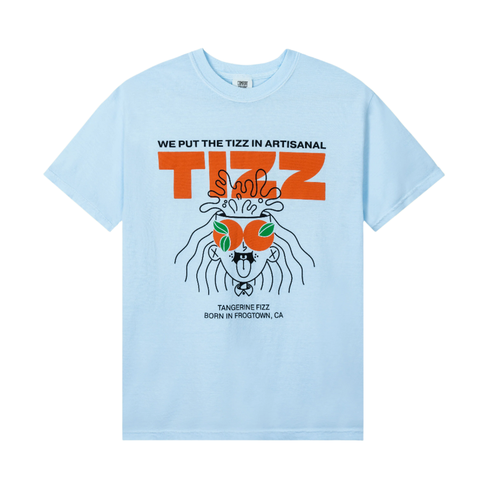 Light blue TIZZ tee with orange We Put The Tizz In Artisanal graphic and Tizzy mascot