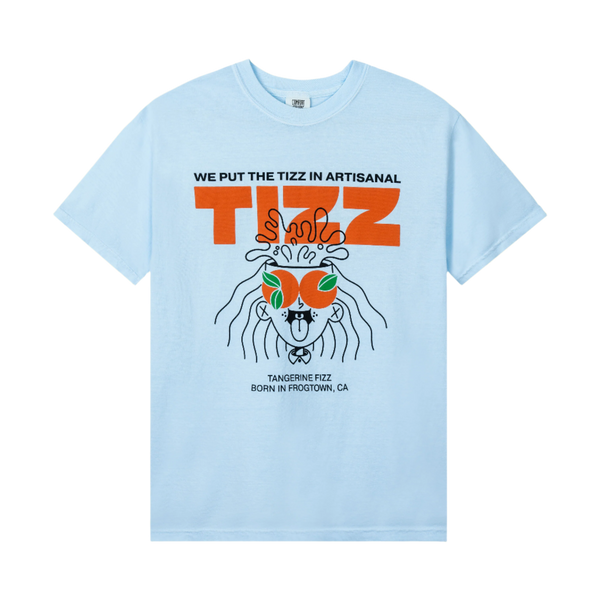 Light blue TIZZ tee with orange We Put The Tizz In Artisanal graphic and Tizzy mascot